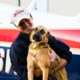Pilots to the Rescue aviator with rescue dog