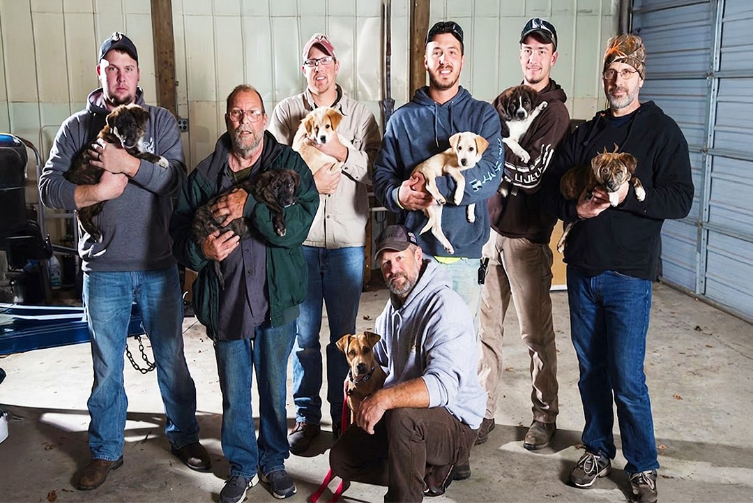 Groomsmen with Annie's puppies