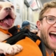 Bryan Reisburg on the subway with a dog in his backpack