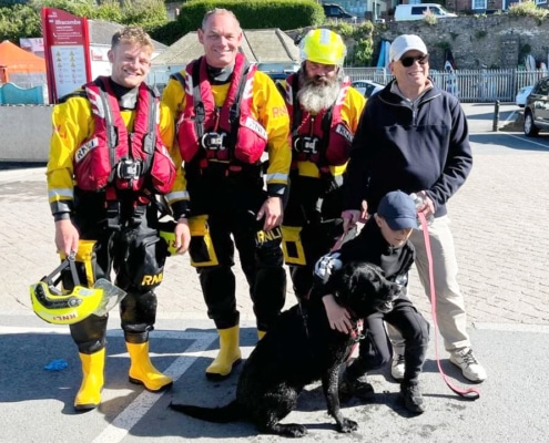 Bailey with Chris Carter and RNLI Crew who saved her
